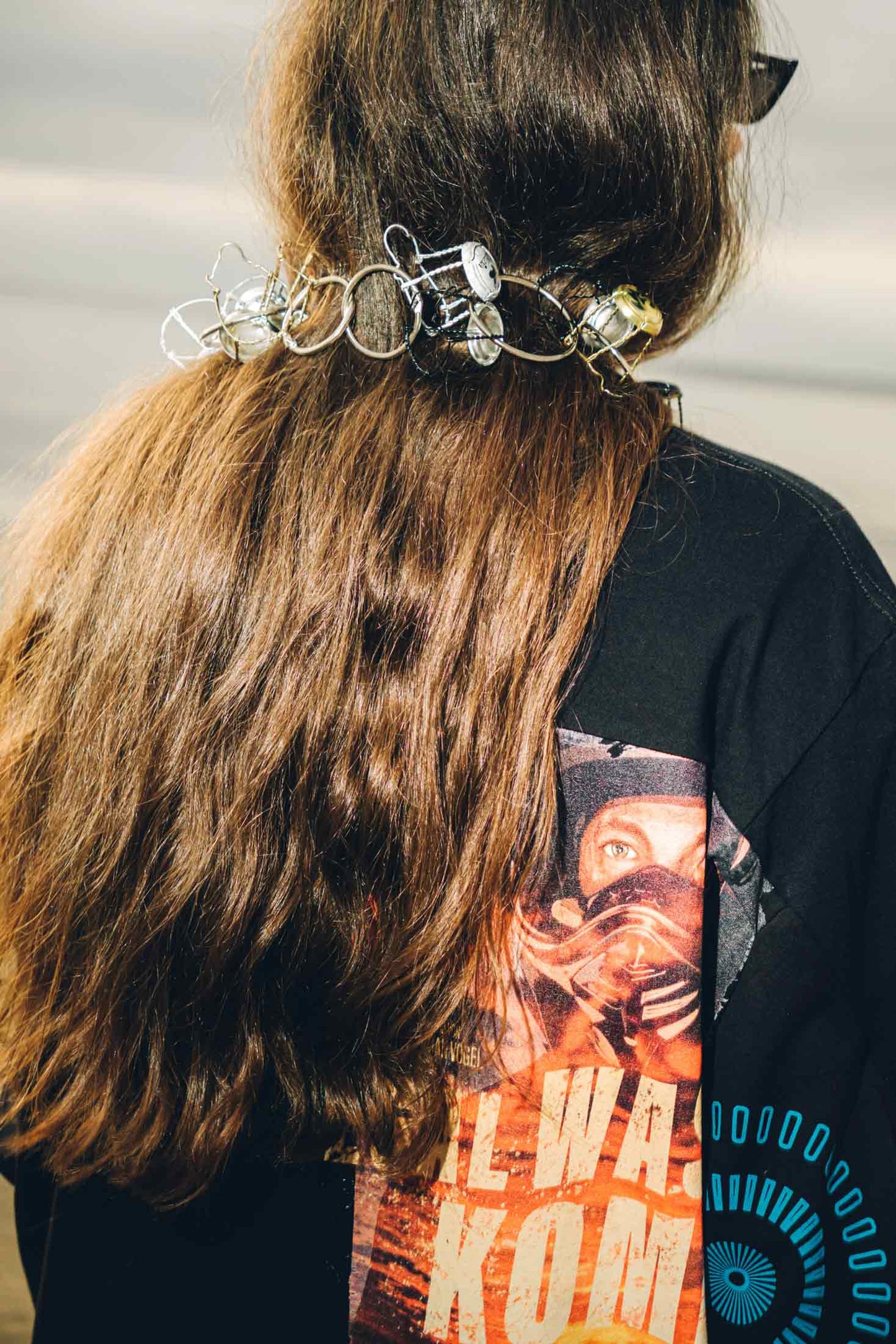 Close-up back view of regenerated cotton t-shirt patchwork texture.