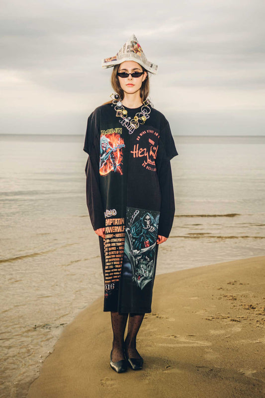 Regenerated graphic t-shirts maxi dress made from black vintage cotton, shown on a model, front view.