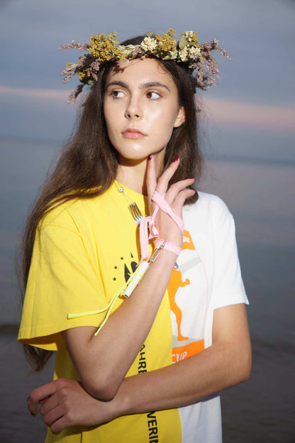 Close-up of vintage t-shirt patchwork fabric on upcycled cotton dress.